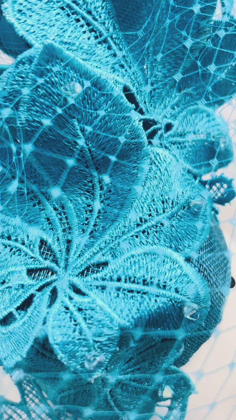 lace and straw tall turquoise blue headpiece